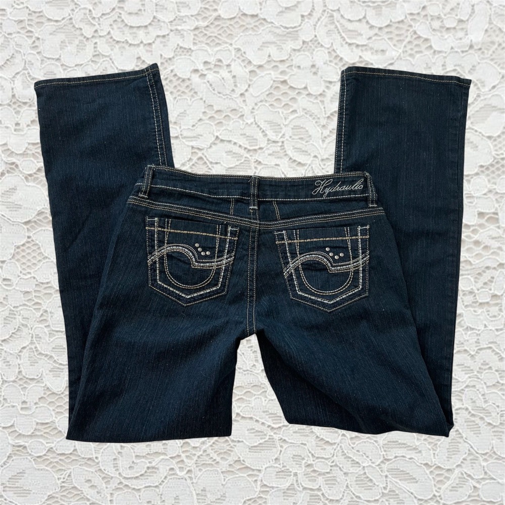 vintage y2k mid rise bootcut jeans with cute butt pocket embellishments